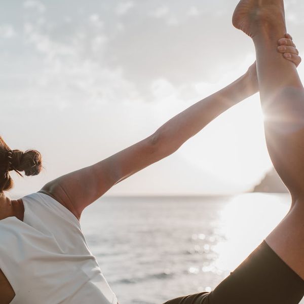 Woman in a peaceful yoga pose demonstrating balance and posture.
